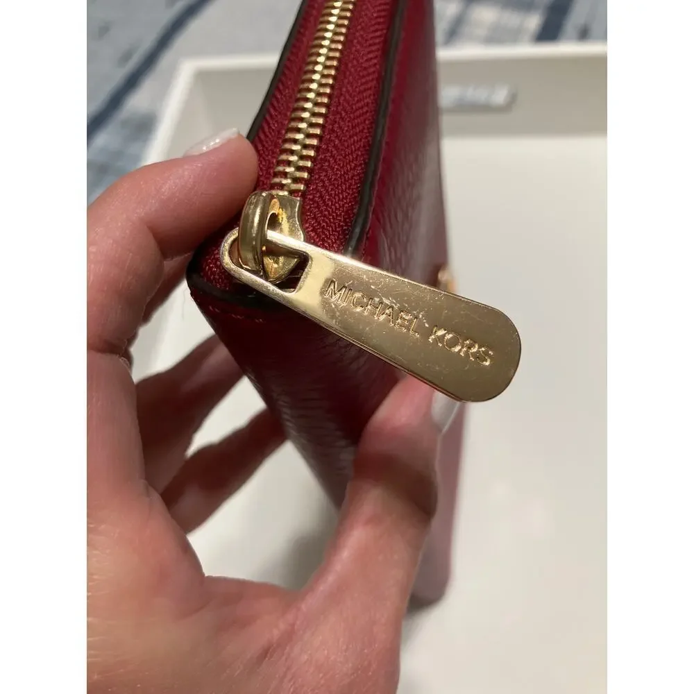 MICHAEL KORS, LARGE RED PEBBLED LEATHER WALLET